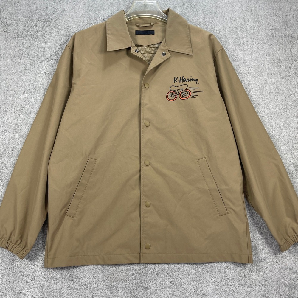 Uniqlo Keith Haring Coach Jacket Mens Large Tan Bicycle Art Graphic Snap Front